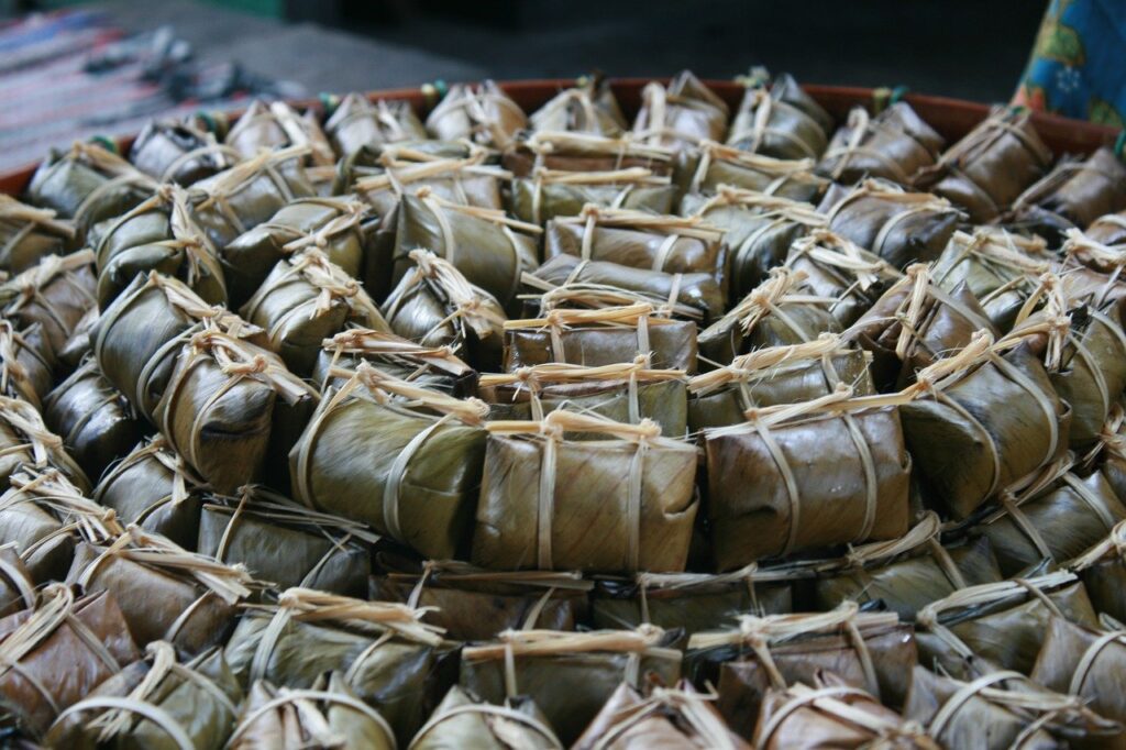 bananas with sticky rice, khao tom mat, thai food